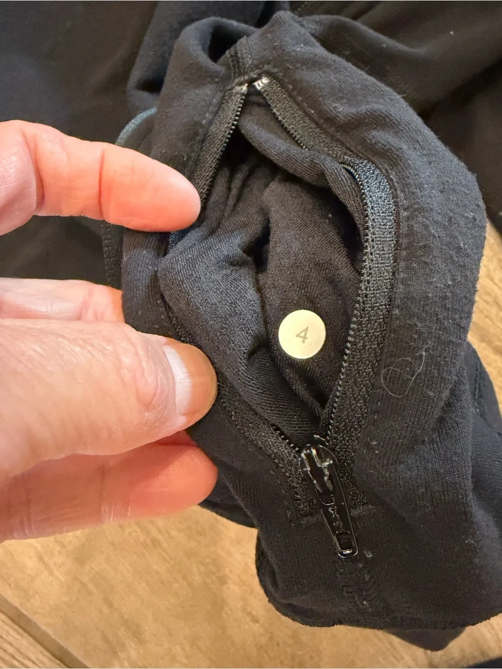 lululemon women’s black hooded Jacket size 4